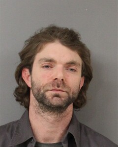 Mugshot of CORK, ADAM